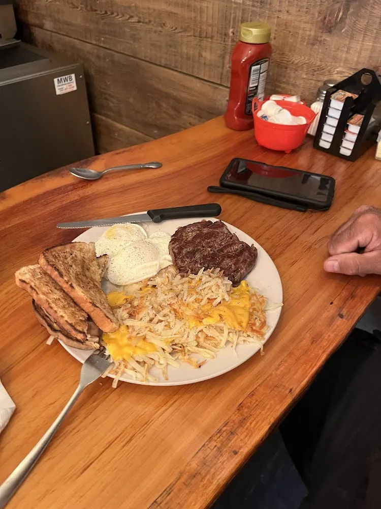 Steak and Eggs Hashbrowns with Cheese and Toast